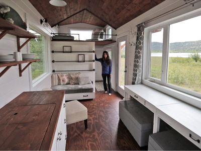 Tiny home builder Ana White shown inside a warm and inviting tiny home