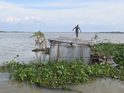 Houses in Innatalipur village of South Surma Upazila of Sylhet are submerged in flood water.