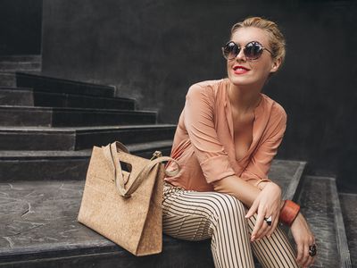 Caucasian woman sitting on stairs