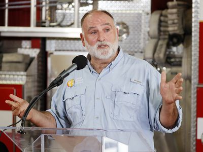 Chef JosÃ© AndrÃ©s speaks at a podium