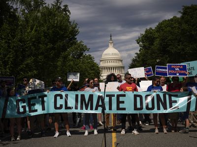 Climate Activists Rally Outside The Supreme Court Over Their Recent EPA Decision