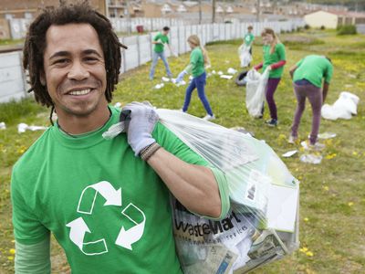 community leader picking up trash