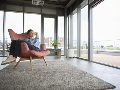 Woman in glass corner