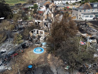 Aftermath of fire in Wennington, Greater London, July 20