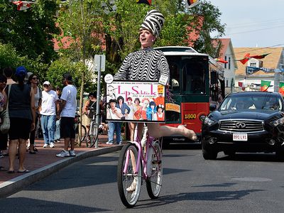  Cabaret performer Lip-Schtick bicycles through downtown Provincetown