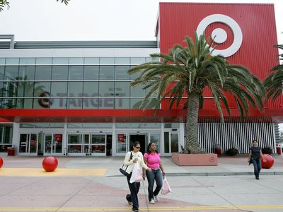 Customers carry bags as they leave a Target store May 15, 2006 in Albany, California. 