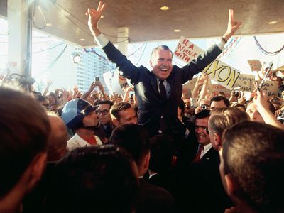 Richard Nixon celebrating with supporters of his