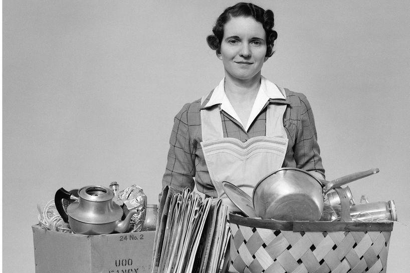 Woman collecting scrap aluminum for war effort