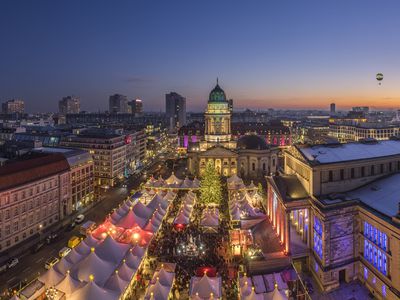 Germany, Berlin, Christmas market at Gendarmenmarkt in the evening