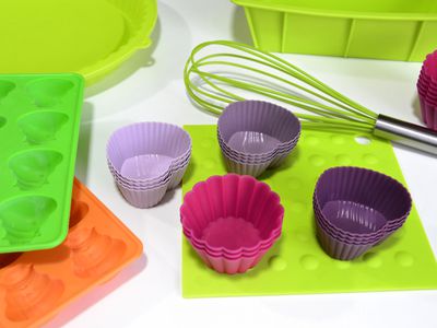 Silicone kitchen implements and bakeware in bright colors