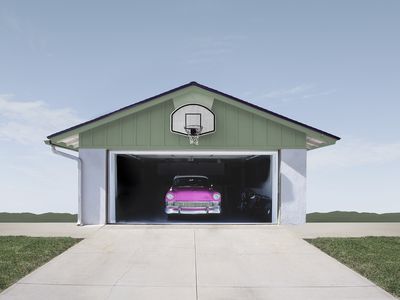 Pink car in a garage