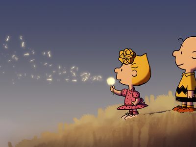 Charlie Brown and Sally with dandelion