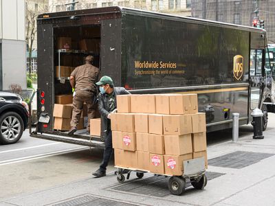 loading UPS truck with boxes