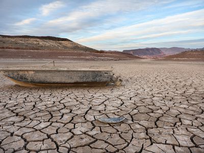 A formerly sunken boat rests on a now-dry section of lakebed at the drought-stricken Lake Mead on May 10, 2022 in the Lake Mead National Recreation Area, Nevada. 