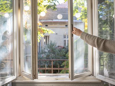 arm opens window with sunshine