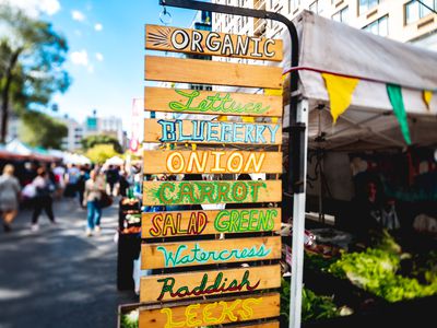 Signs for vegetables and greens for Sale