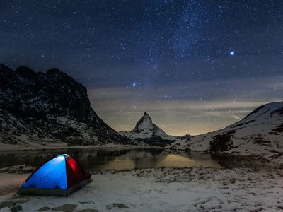 starry night sky over the Matterhorn peak in Zermatt, Switzerland