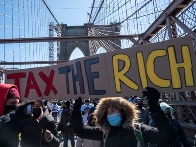 Activists March Across Brooklyn Bridge Demanding Funding For Excluded Workers In NY State Budget