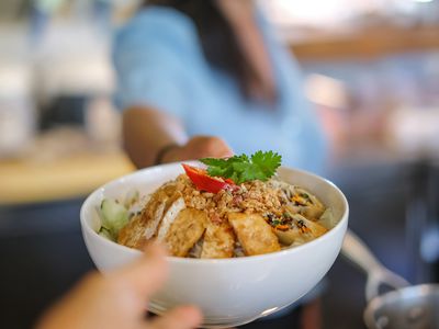 Unrecognizable Manager Giving Food to Customer at Self-Service Dine in Restaurant