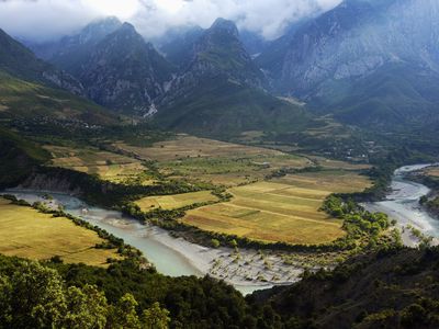 Vjosa river valley, NemÃ«rÃ§ka mountain in background, Albania