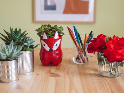 various items upcycled into new household objects including planters and vases