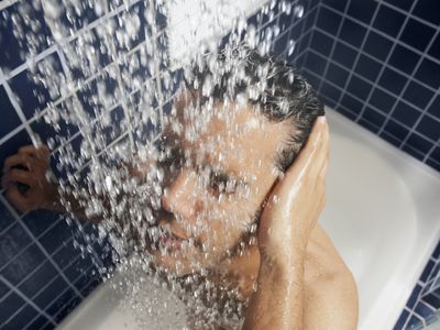 young man in shower